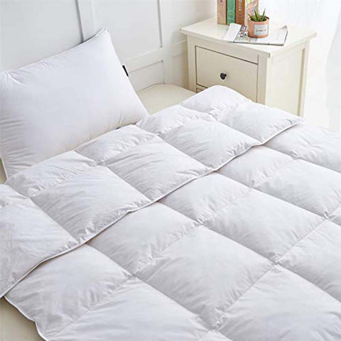 Couette en duvet suisse Extra Light Nouvelle